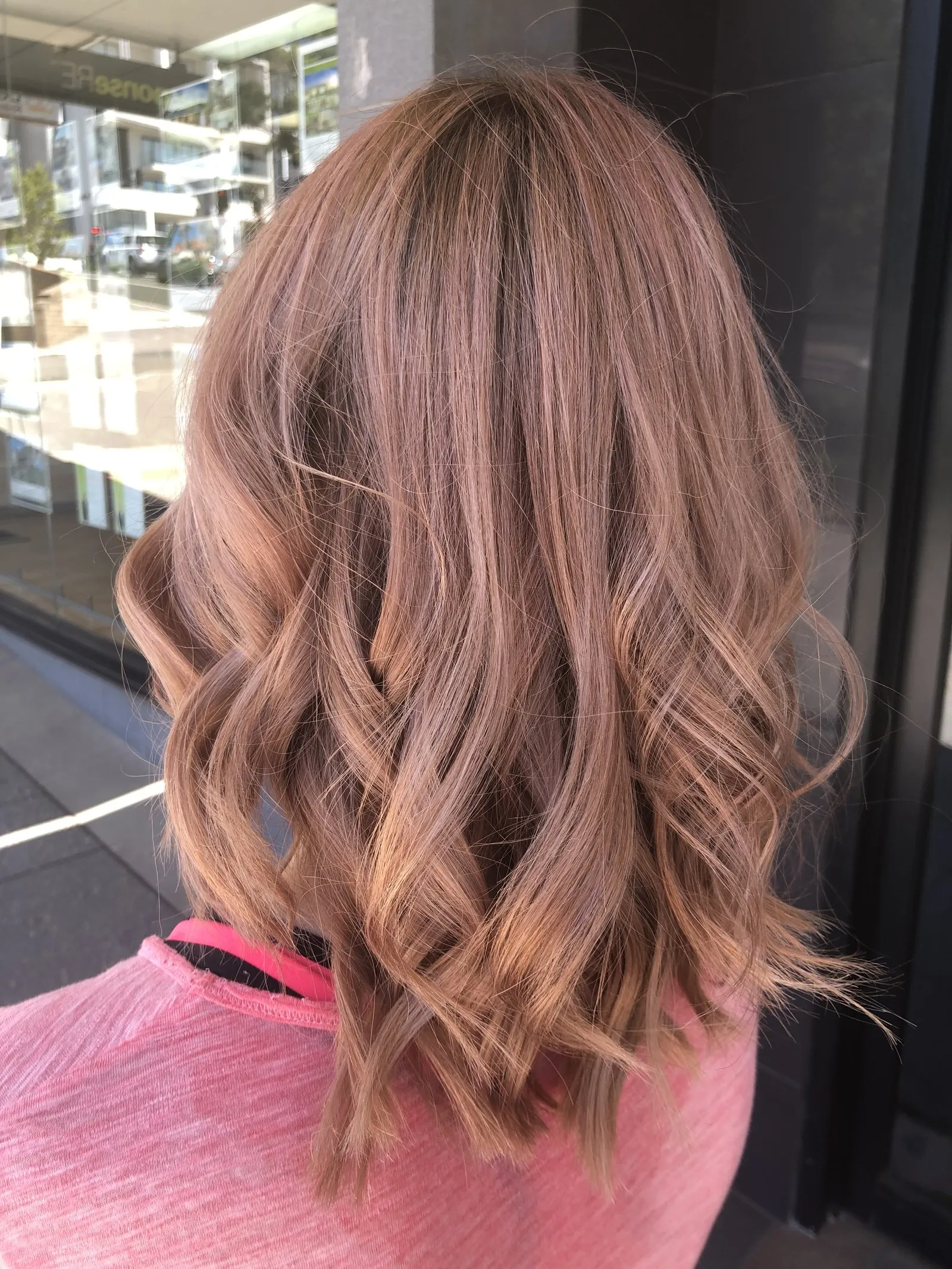 Rose gold warm wavy lob colour at DC Hair Lounge Baulkham Hills