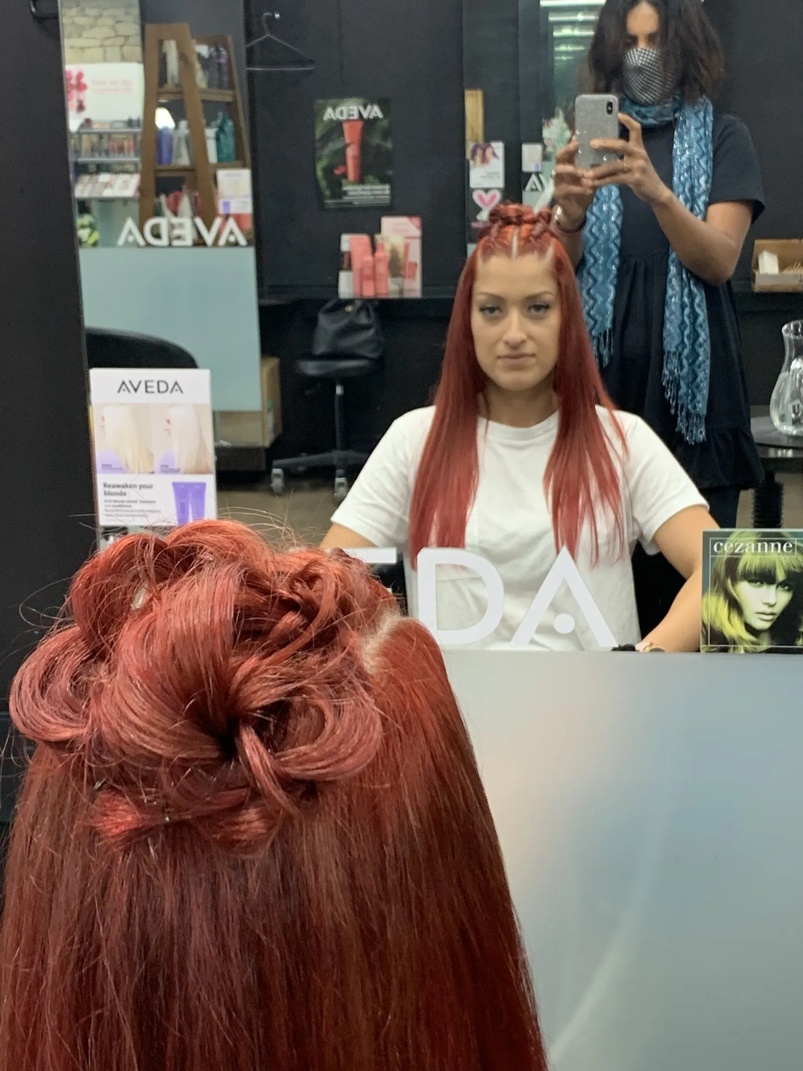 Vivid red braided updo colour at DC Hair Lounge Baulkham Hills