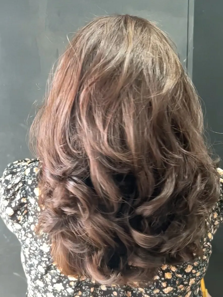 Dark to copper balayage with curls at DC Hair Lounge