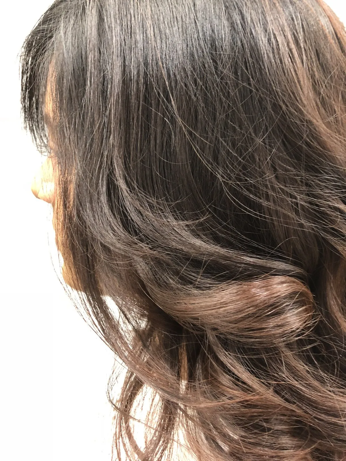 Dark brunette with caramel foil highlights at DC Hair Lounge Baulkham Hills