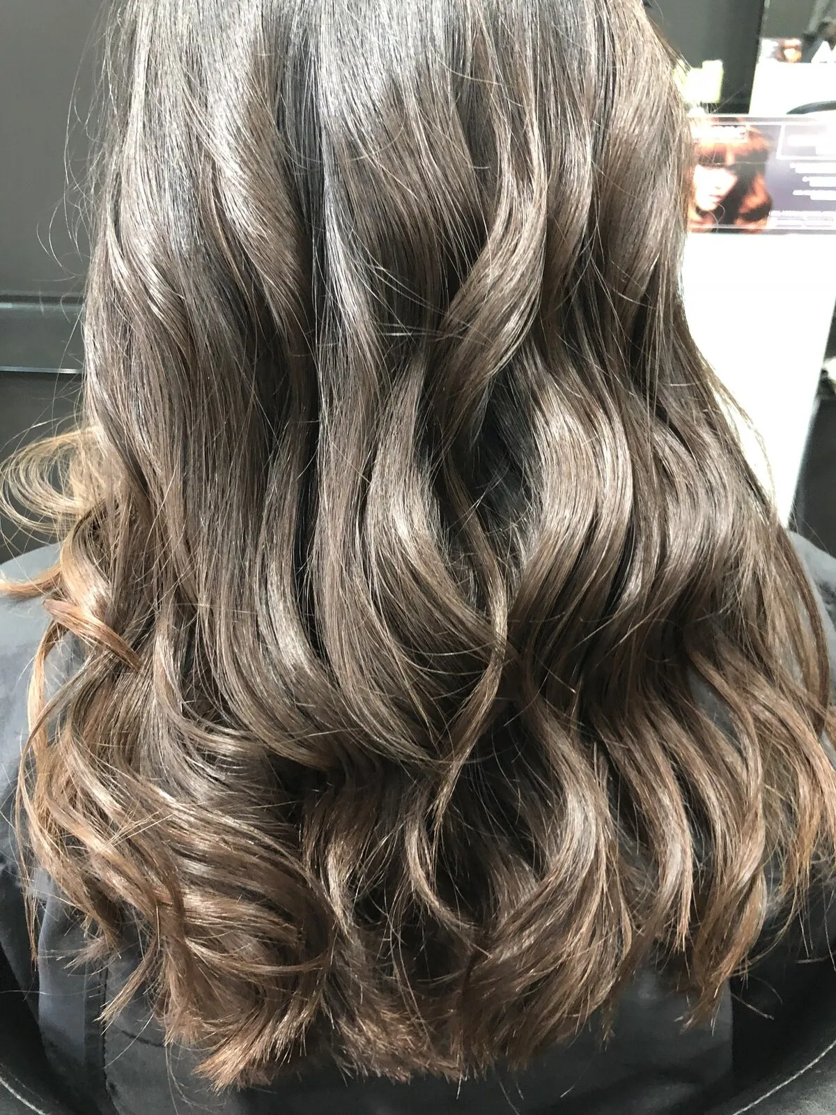 Ashy brunette bouncy curl styling at DC Hair Lounge Baulkham Hills